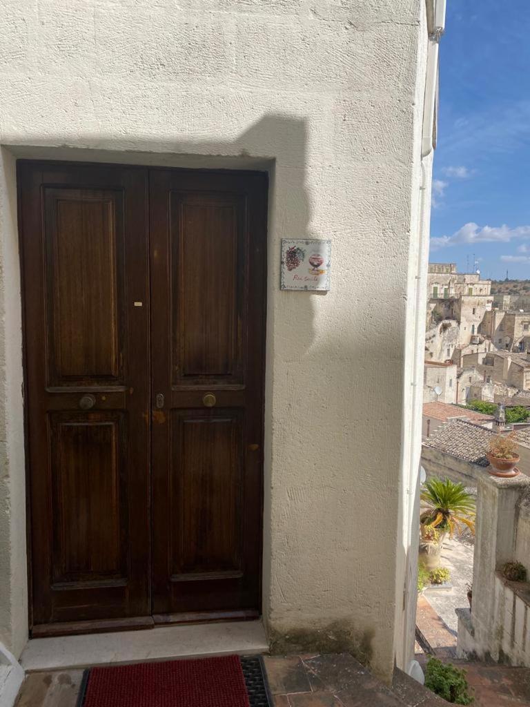 Residence Le Vie Del Mosto Matera Habitación foto